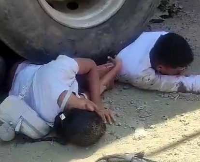 Couple on motorcycle crashed under heavy truck wheels 