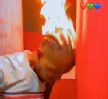 Rival Tied to a Pole and Head Set on Fire for Fun.