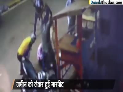 Goons Beating a Man With Sticks and Weapons