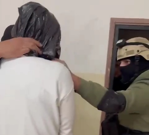 Palestinian police abusing civilian in police station 