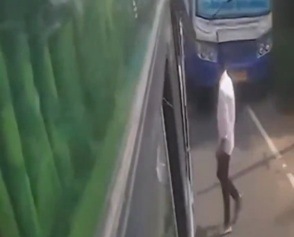 Indian man Twisted Between Bus and Truck 
