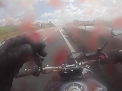 Speeding Biker Catches a Kite Line.