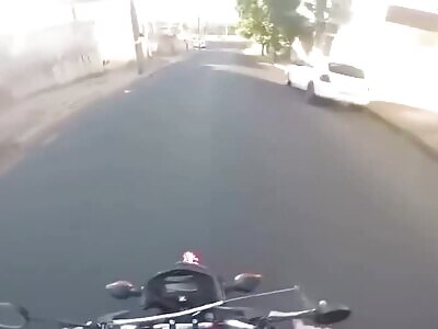 Motorcyclist Gets Instant Karma After Flipping Off A Car