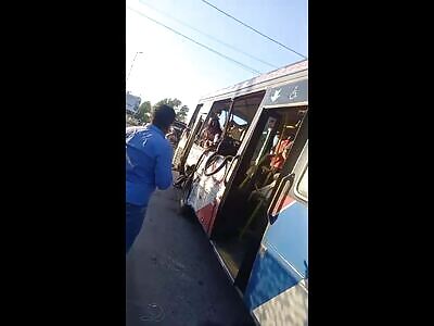 Truck driver ignores red light and crashes into a bus