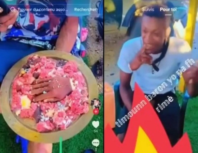 [CANNIBALISM]Haitians preparing dinner with their rival meat