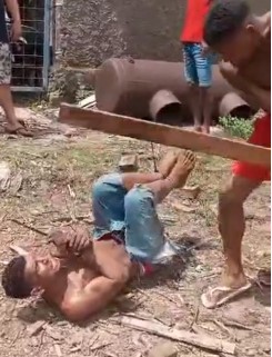 thief beaten and thrown off a cliff