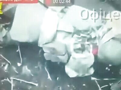  Wounded russian soldier putting a grenade under his head.