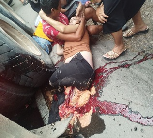 Female Rider Falls Under Truck Wheels.