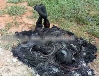 Unidentified man burned alive in Cemetery in Indonesia
