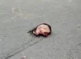 Chinese girl riding moped decapitated head after a traffic accident