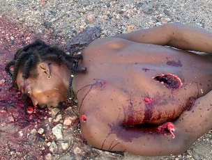 Haitian gang member overkilled 