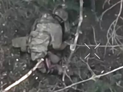 Russian ate a burst of machine gun fire.