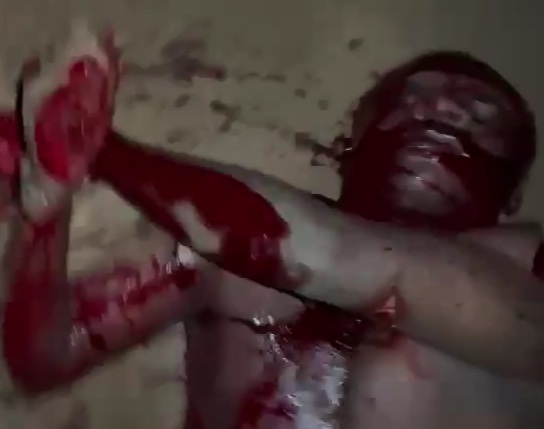 Rival butchered and stoned to death by THE BLACK AXE GANG MEMBERS 