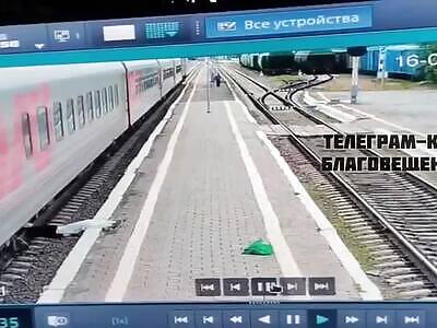 Woman Places Her Head Under Train