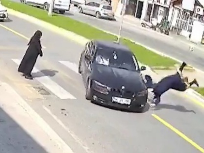Woman trying to cross the Street Rag Dolled
