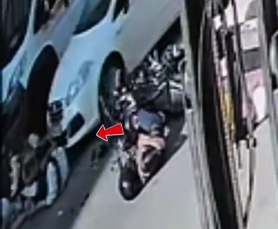 Female driver crashed fallen injured biker suffered from collision 