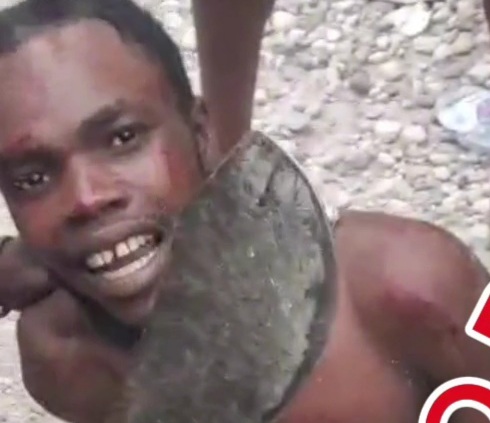 Gang member captured and punished hard by angry crowds 