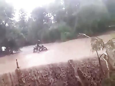 Rider gets washed away