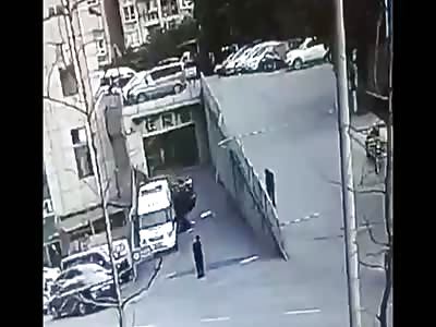 Reversing car hits man off road