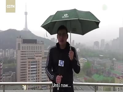Footage: News anchor hit by lightning while reporting in rainstorm