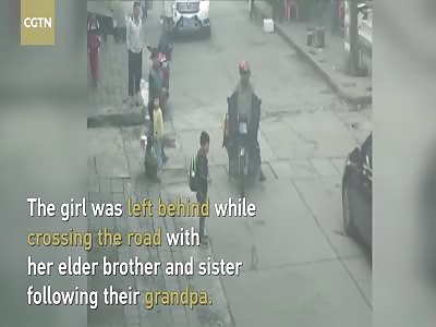 Girl miraculously escapes injury after being run over by car in SW China