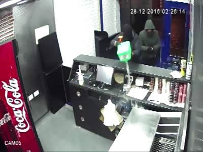 Pizza shop owner tackles arsonists trying to set his business alight