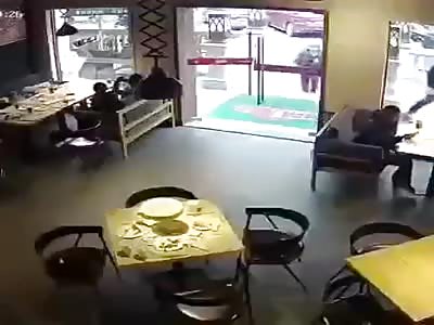Man breaks glass door.