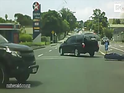 Shocking Moment Body Bag Falls From Hearse