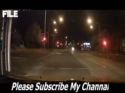 Shocking moment car slams into another at traffic lights