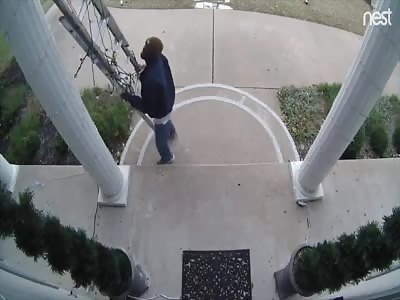 Good Samaritan Calls 911 to Rescue â€˜Manâ€™ Dangling From Roof in Holiday