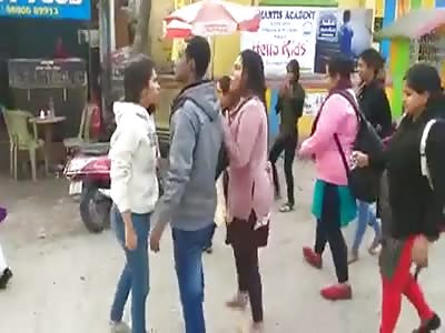 Two college students fighting