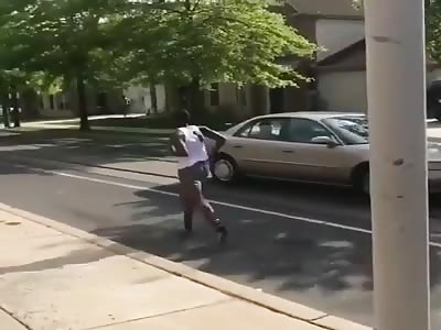 Woman chases her man around town with a knife