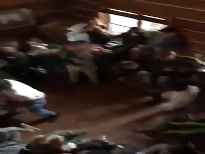 Small scuffle at a frat party devolves into a massive fight.