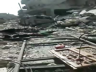 many shattered body's after air strikes of Syrian regime on civilian