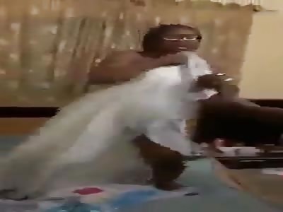 Granny trying to protect her lover from beating 