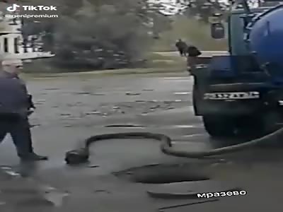 Old man fall in open sewer 