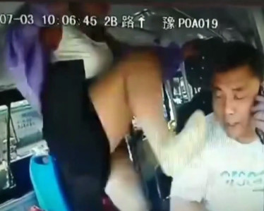 Woman Attacked Driver Before Bus Plunged Off Chinese Bridge, Killing 15