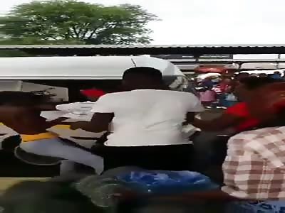 Two African girl fighting with their boobs out