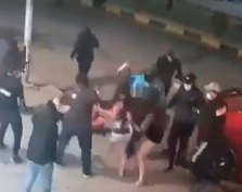 Massage Parlor Workers Dragged out and Beaten by Mob.