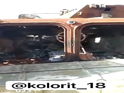 burnt Armenian soldiers remains in burned tank