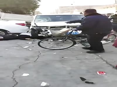 Chinese couple crushed to death by stupid woman driver 