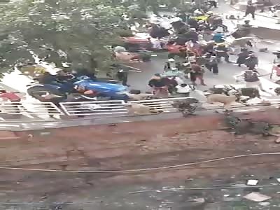 Indian farmers riot in India.