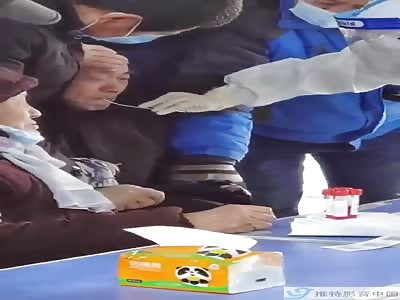 Chinese old man forced to have Corona virus test 
