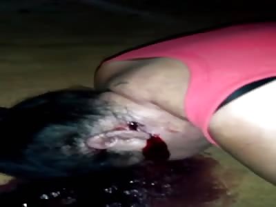 Fat Brazilian woman shot dead.