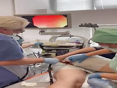 Doctor removes cucumber stick on ass