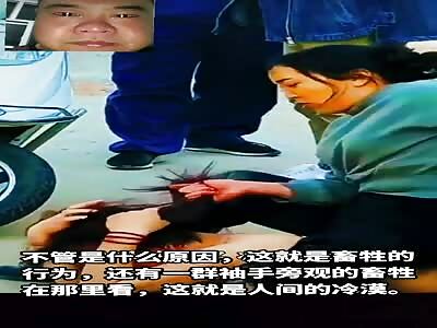 Angry wife removing hair from the head of her husband mistress 