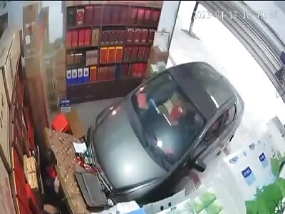Car crash inside store 