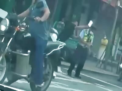 Fatal hit with meat cleaver to the head of Chinese cop.