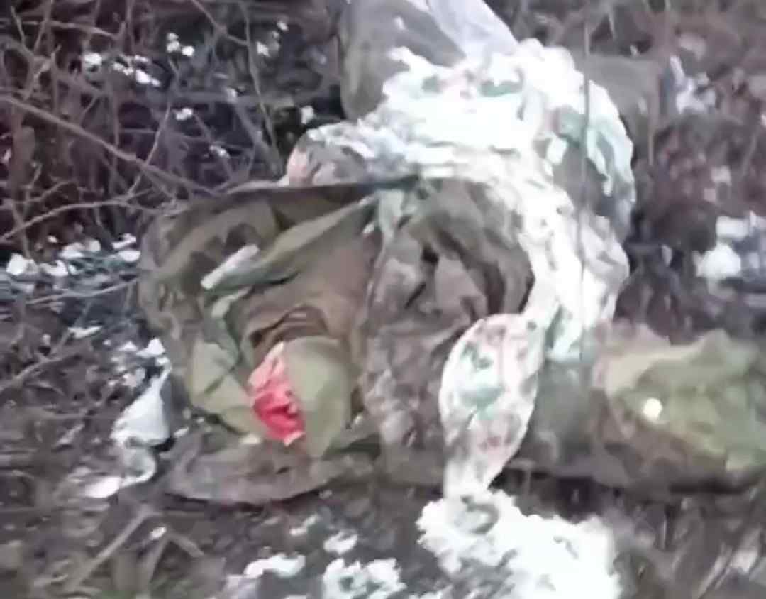 Decapitated Ukrainian corpse.