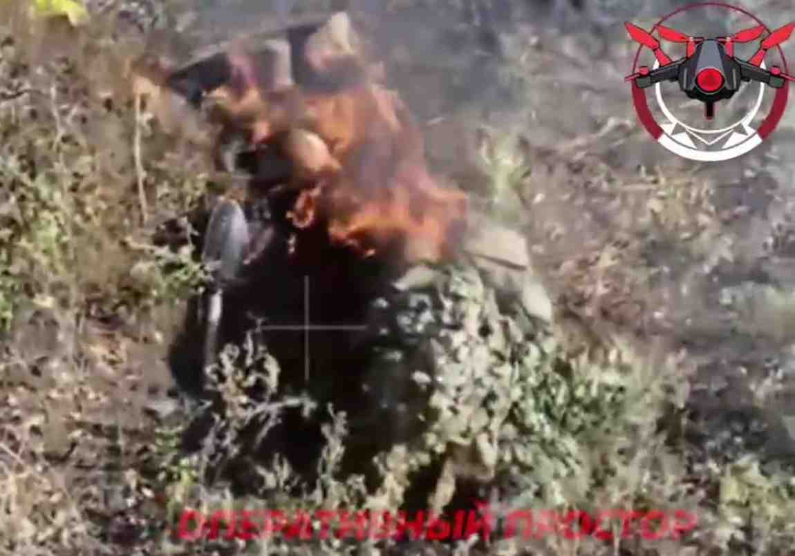 Ukrainian sniper with broken legs burning.